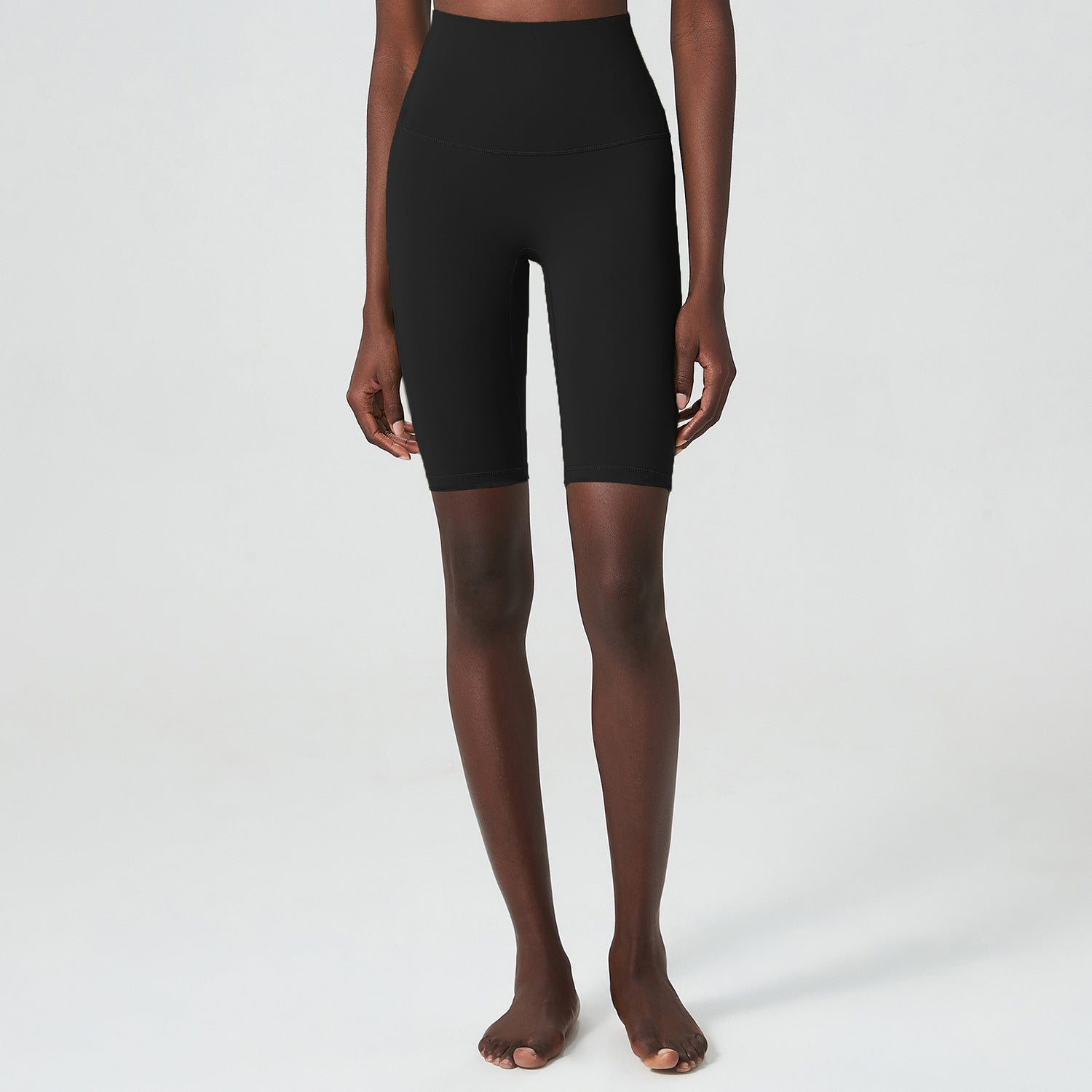 Close-up of a model wearing a blue sports bra from Sansara Sportswear, showcasing style and comfort for activewear.