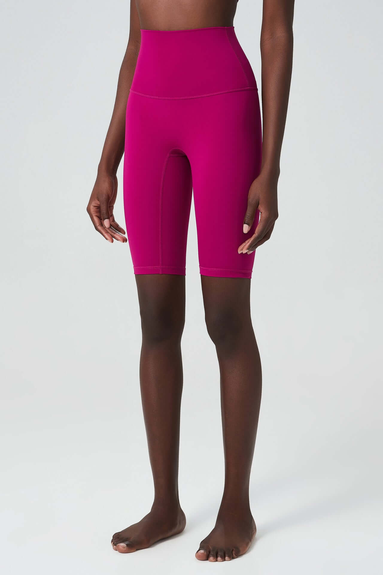 Close-up of a model wearing a blue sports bra from Sansara Sportswear, showcasing style and comfort for activewear.